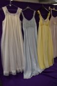 Five nylon nightdresses including double layered Kayser and blue single layered Kayser, one white