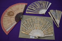 A mixed lot of four fans, showing signs of damage and shattering,however,could be of use for study
