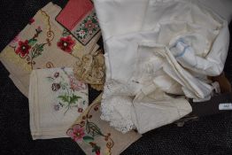 A collection of vintage and antique table linen with embroidered pieces, crotchet work and some