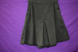 A pair of bottle green 1940s culottes/shorts, pleats to sides and button fastening to each.