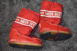 An original pair of 1980s red moon boots, approx size 9 or 10.