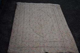 A pretty paisley cotton single bed throw,cotton wool filled and backed in mauve, reverse has a few