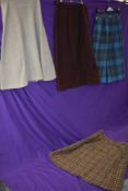 Four vintage 1950s skirts, one having ILGWU label, another with a Stockton of Dallas label having