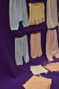 A lovely collection of vintage lingerie including bloomers, petticoats,bra,girdle and cami