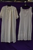 A victorian nightdress having 3/4 sleeves,trimmed to bodice with broderie anglais and a petticoat