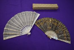 Two late 19th/early 20th century fans, both having sequins and spangles on gauze like fabrics.