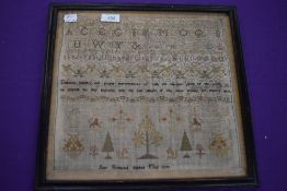A Framed sampler with finish date of 1797, depicting Alphabet, animals and proverbs, and a name of