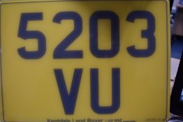 A private registration number plate on retention 5203VU