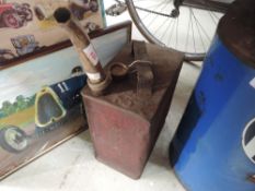 An original Shell motor spirit petrol can with nozzle