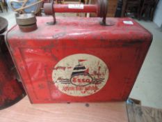 A scarce 18 pint petrol can advertising Esso motor boat services.