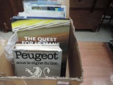 A varied lot of good motoring books and pamphlets for Peugeot, Le mans,and more, around 1956