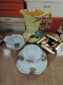 A mixed lot of ceramics including Burleigh ware vase having bird detail to handle,Carlton ware ash