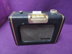 A vintage blue 'Ever ready' radio.
