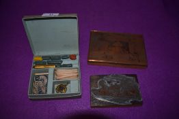 Two vintage printing plates and a Dennisons letter wax set.