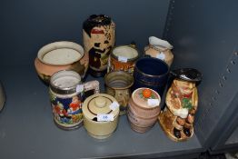 A selection of vintage vases and tankards and condiment jars, various styles and sizes.