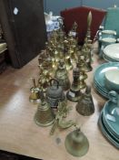 A large lot of brass bells, varied sizes and styles.