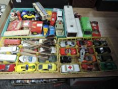 A collection of Matchbox, Corgi and similar cars and vehicles,vintage darts and similar.