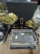 Two sets of vintage scales one having a selection of brass weights.