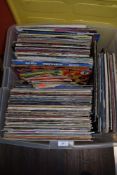 A selection of vinyl records and albums including pop and rock interest