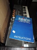 A Saisho stereo keyboard MK 800 music maker.