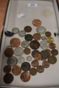 A selection of collectable coins and currency