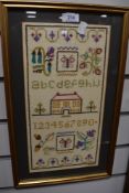 a small needle work sampler by Helen