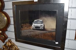 A photographic print of rally car in modern frame