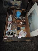 A mixed collection of items including costume jewellery,pictures, vases,bottle stoppers and a