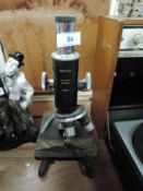 A Watson Barnet microscope.