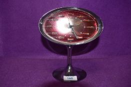A mid century atomic styled Japanese Rhythm alarm clock.