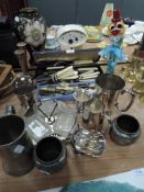 A mixed collection of vintage cutlery and plated ware including condiment set with glass dish