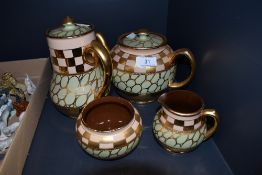A part tea service by Sadler with green and lustre glaze