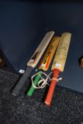Three miniature cricket bats two bearing signatures one dated 1998 and similar
