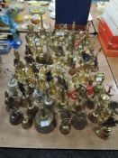 A large collection of predominantly brass vintage and retro bells.