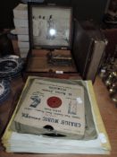 A large Edwardian wooden Polyphon music box and 20 discs,also included is a selection of shellac