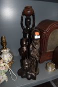A selection of African tribal figures in heavy ethnic woods