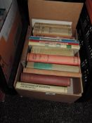 Two mixed boxes of books, including novels, guides and more.