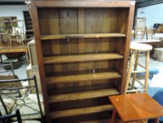 A traditional oak open bookshelf, approx dimensions W92 H162 D30cm