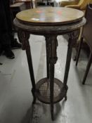 A classical style plant stand having circular marble top and bergere undertier, diameter approx.
