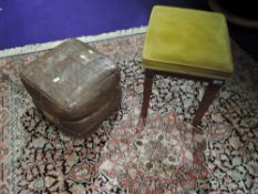 A reproduction dressing table stool and a vintage leather pouffe