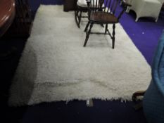A vintage shag pile rug, approx. 240 x 170cm
