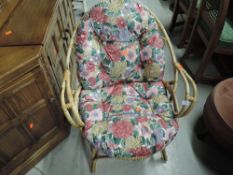 A vintage canework conservatory chair