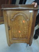 An oak and inlaid corner cupboard , width approx. 53cm