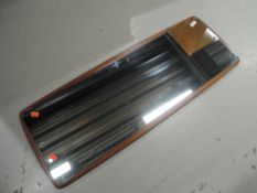 A vintage full length wall mirror, teak backed, height approx. 95cm