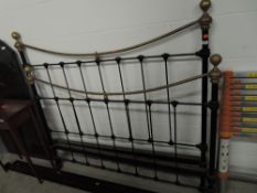 An Anique part brass double bed, includes irons, width approx 135cm