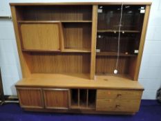 A vintage laminate teak effect lounge display unit, width approx. 183cm