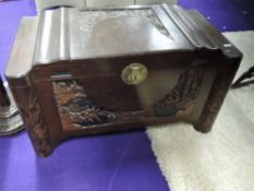 A Chinese bedding box having carved panel decoration