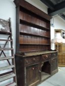 A rustic stained frame farmouse kitchen dresser, width approx. 178cm