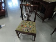 An early 19th Century mahogany dining chair having later tapestry seat