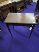 An Edwardian mahogany and inlaid fold over card table, in need of restoration, approx. 69 x 42cm